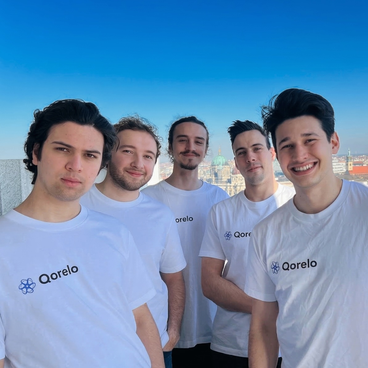 Qorelo team wearing branded Qorelo shirts